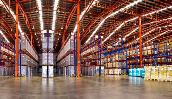 Warehouse industrial and logistics companies. Commercial warehouse. Huge distribution warehouse with high shelves. Low angle view.